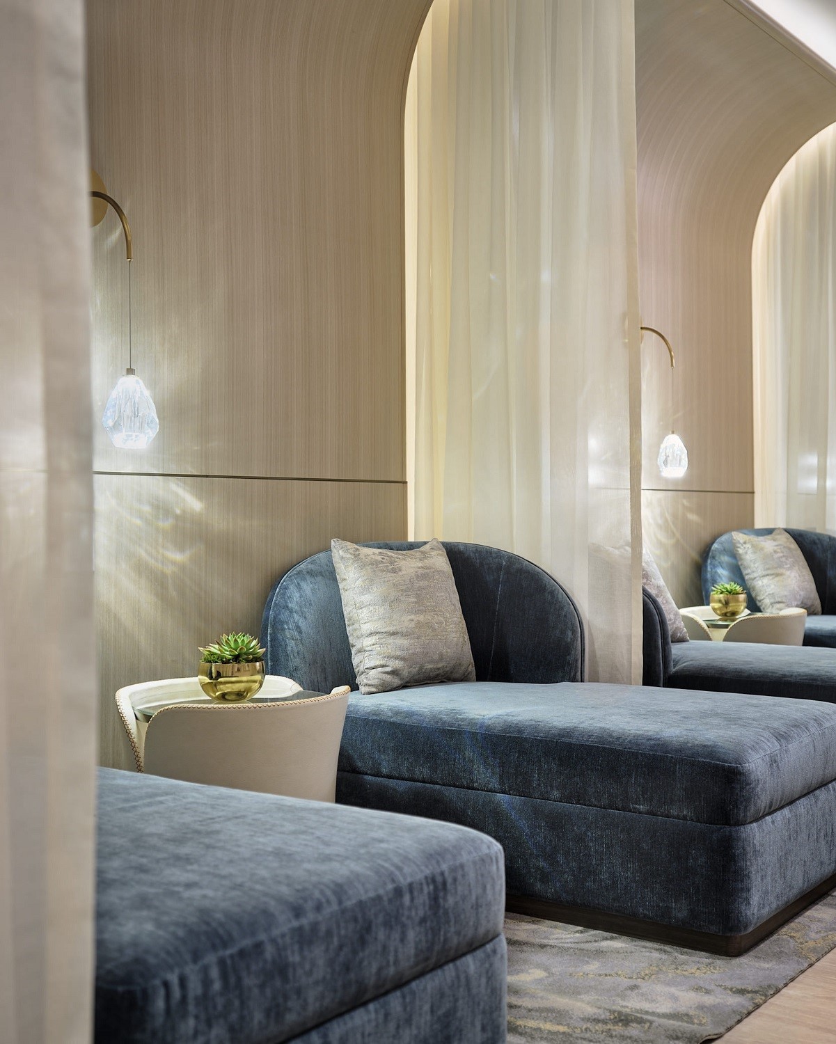 feature lighting and comfortable loungers in private booths in spa