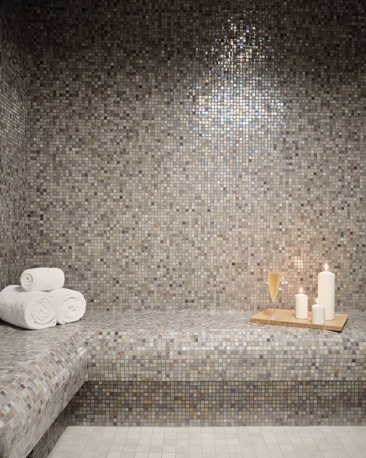 mosaic surfaces on wall and bench in sauna of spa