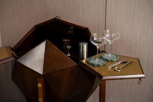 M.Vuillermoz Polyhedron’s 1960 mahogany polyhedron shaped bar cabinet from France in Four Seasons New York
