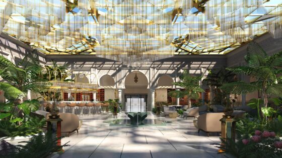 central lobby in Four Seasons Hotel Rabat at Kasr Al Bahr with fountain, plants and glass covered roof