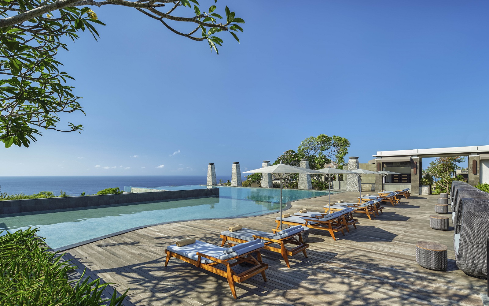 sunloungers and pool with seaview at Bali