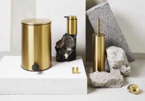 brass pedal bin with matching taps and toilet cleaner from Reframe by Unidrain