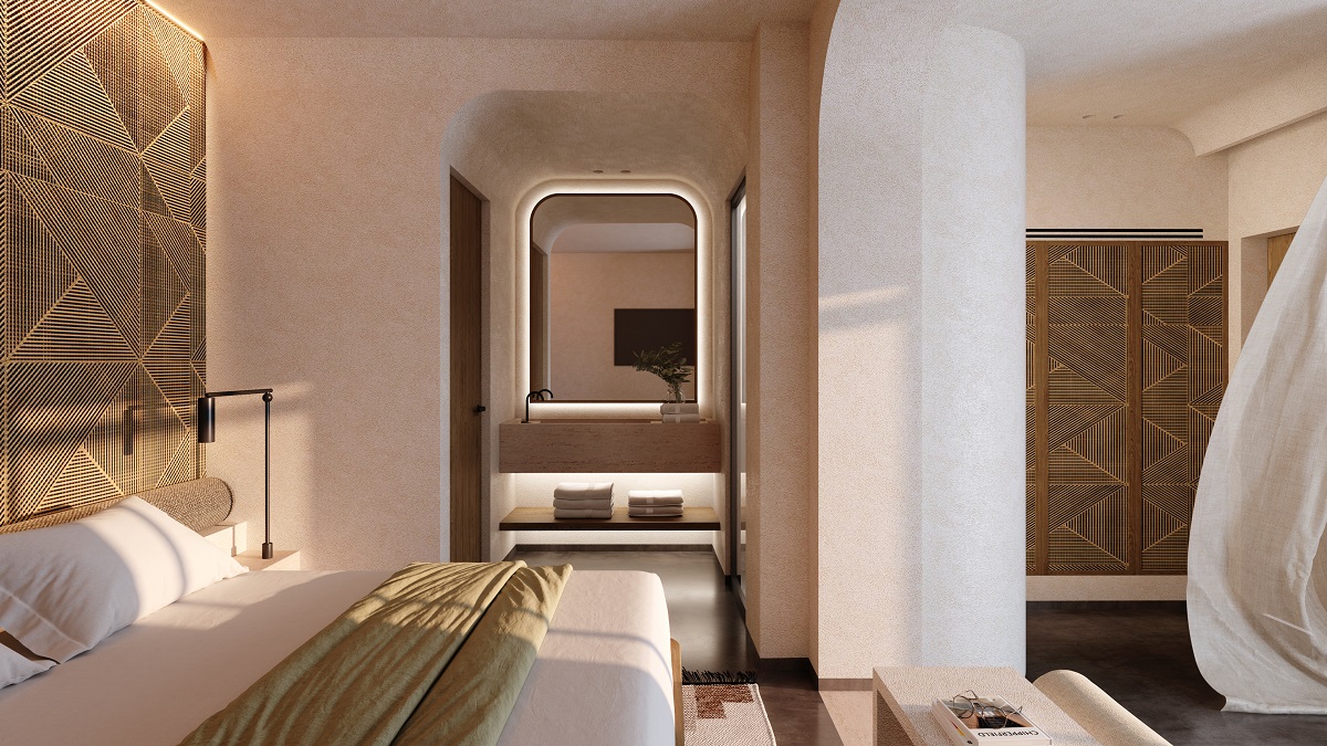 A luxurious suite, with geometric patterns above the bed in the bedroom