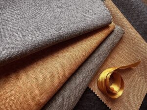 grey and gold fabric from the Kiara range from Skopos