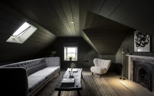 black wood panelling in an attic room in Lundies House in Scotland