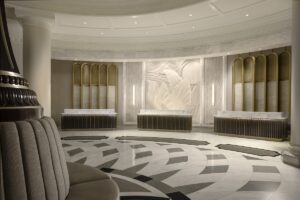 cream and white patterned marble floor in curved lobby of Waldorf Astoria Orlando