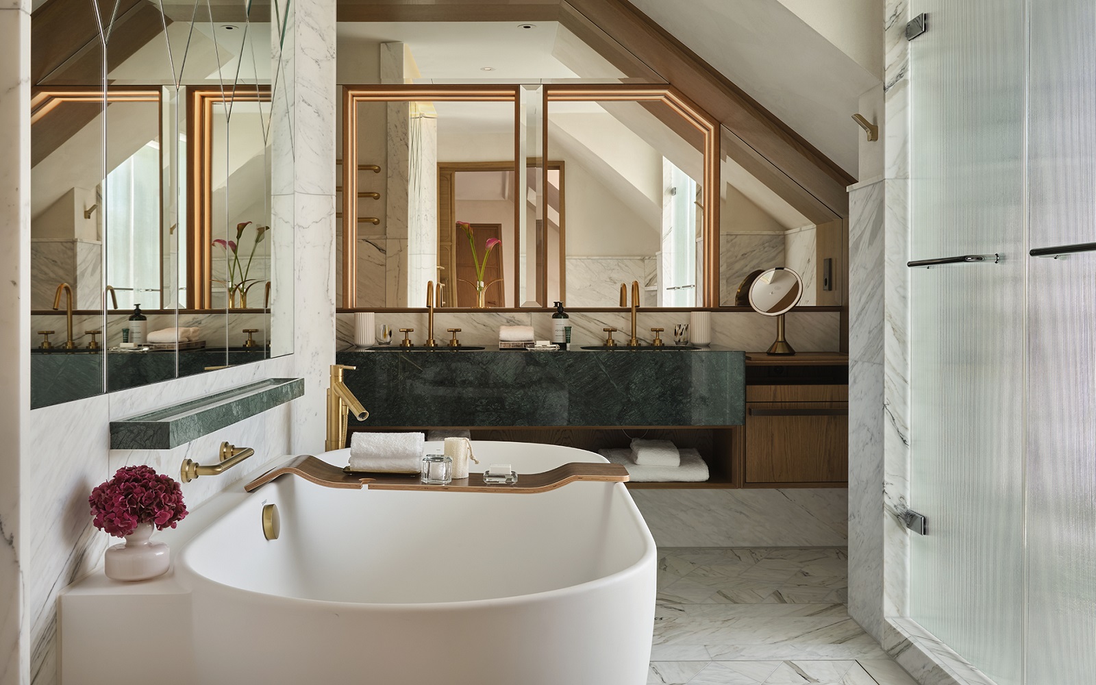 Image caption: Bathroom inside Rosewood Munich, designed by Tara Bernerd & Partners