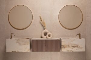 round mirrors above double marble basin in Alpine collection from bagnodesign