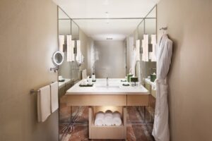 vanity unit in minimal ensuite bathroom design for Conrad Singapore Orchard