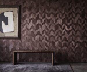 art deco inspired dark brown wood veneer wallcovering with bench and art work