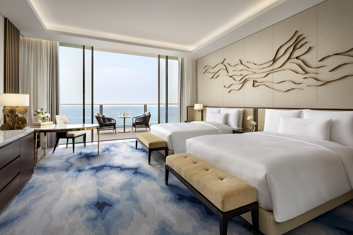 cream and blue sea themed guestroom in Atlantis The Royal