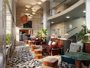 double volume ceiling with patterned floor and comfortable seating in the lobby of The Hoxton Vienna