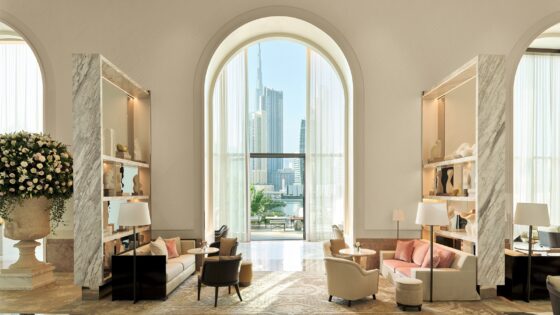 The lobby with doors opening to view across Dubai at The Lana Dorchester Collection