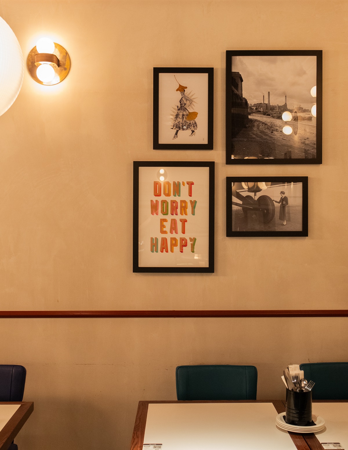 curated gallery on restaurant wall with prints from the Artiq portfolio