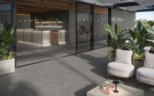 outdoor space moving into interior with same floor treatment to create a flow