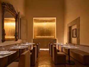 bar and restaurant at casa Alondra with plaster and gold surfaces