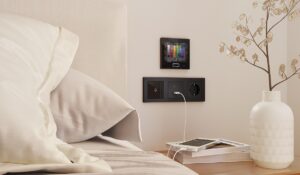 remote phone charger, light control air-conditioning control in hotel guestroom by Zennio