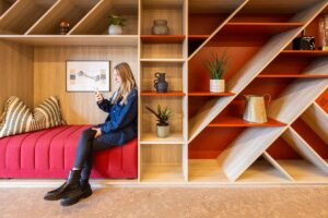 wooden wall divider and shelving, seating unit with cork flooring
