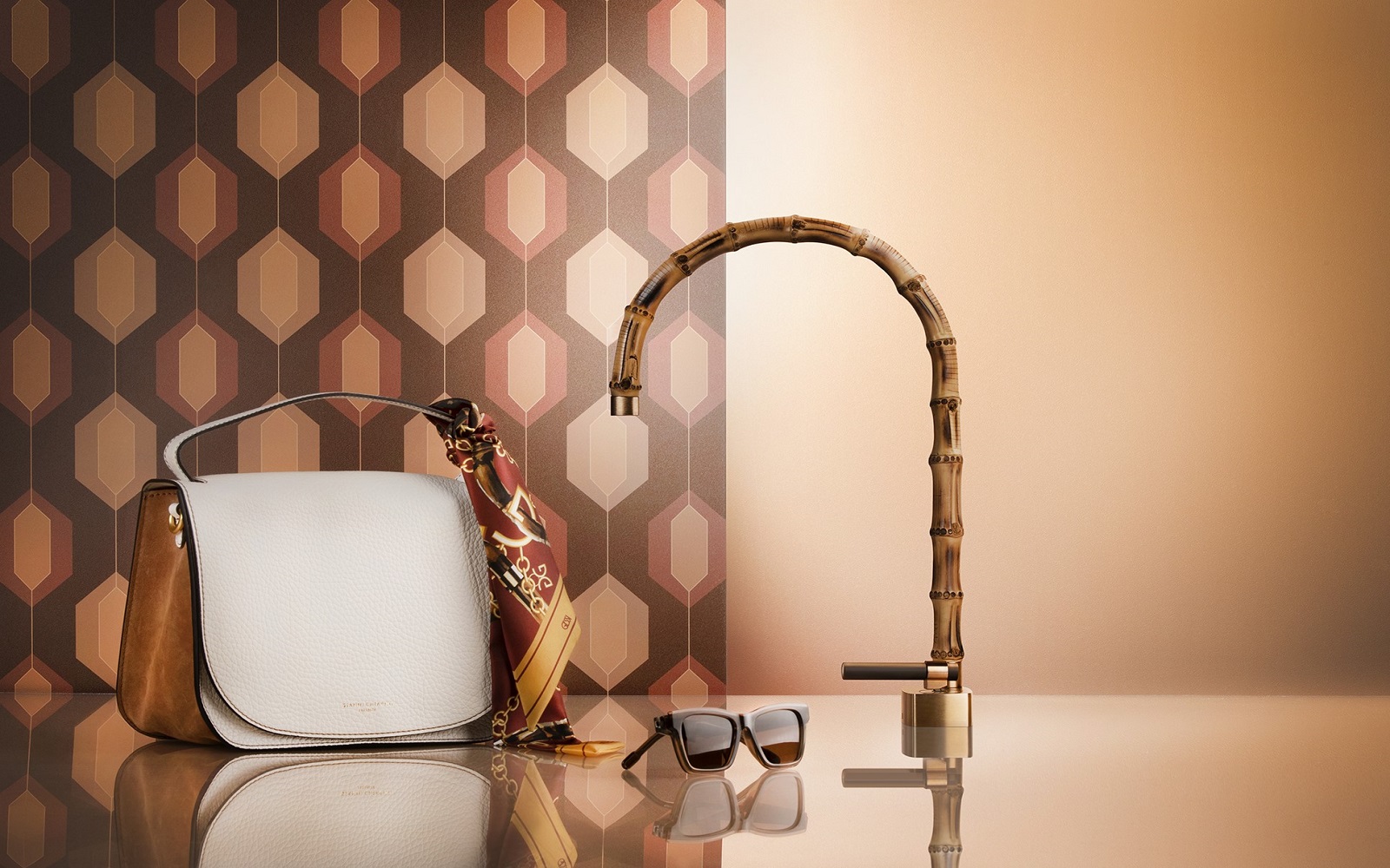 bamboo bathroom tap in the Jacqueline collection from Gessi with handbag and sunglasses