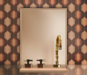 Gessi bamboo Jacqueline bathroom tap with brassware against patterned wall