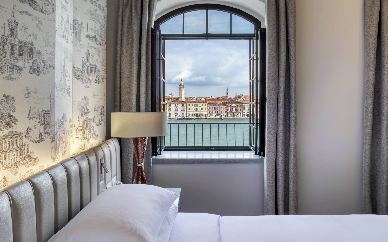 view across the canal to Venice from guestroom in Hilton Molino Stucky Venice
