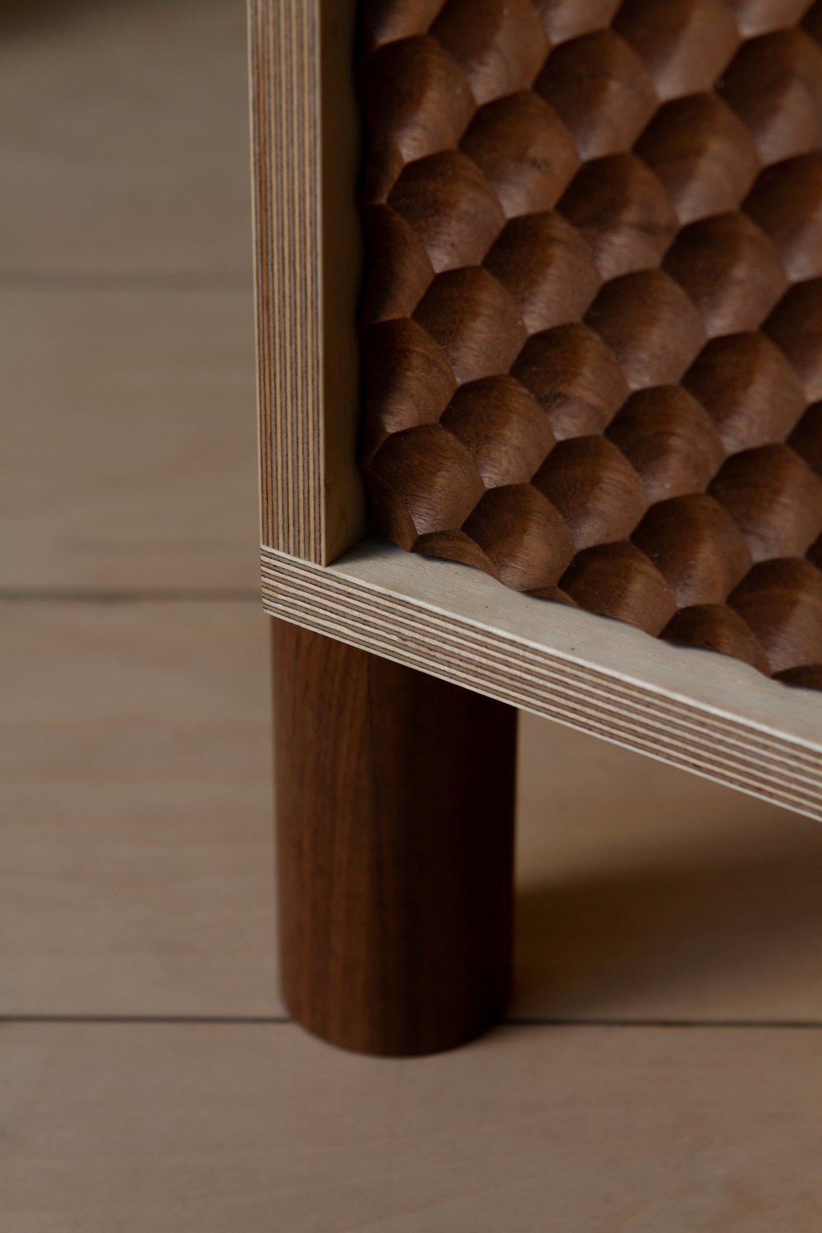 detail of leg and textured door of wooden kobi sideboard