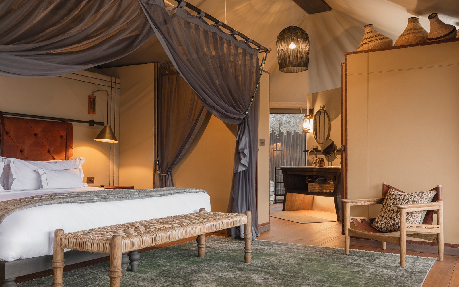 guestroom and bathroom at Madwaleni Lodge designed by Luxury Frontiers