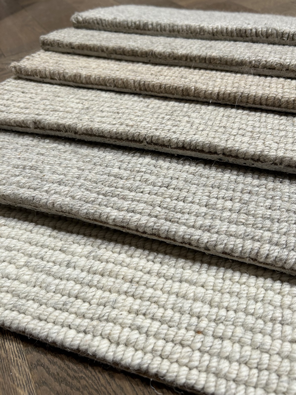 textured and striped wool carpet in natural colours cream and brown