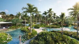 palm trees and swimming pools in the gardens at Four Seasons resort