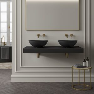 double basin vanity with black basins against a panelled grey wall