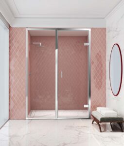 pink tiled and marble surfaces in a shower enclosure