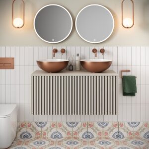 double round backlit mirror in bathroom with bathroom lights on either side above a wall hung wooden vanity