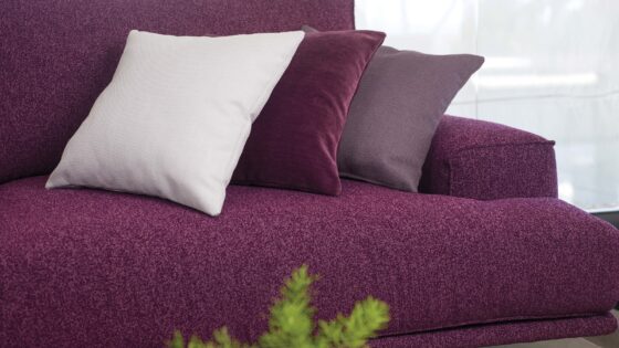 sofa and cushions in shades of purple in Sekers Garcia fabric collection