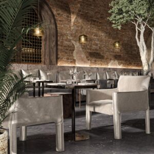 outdoor tables and seating under olive tree with chairs in manero fabric by Sekers