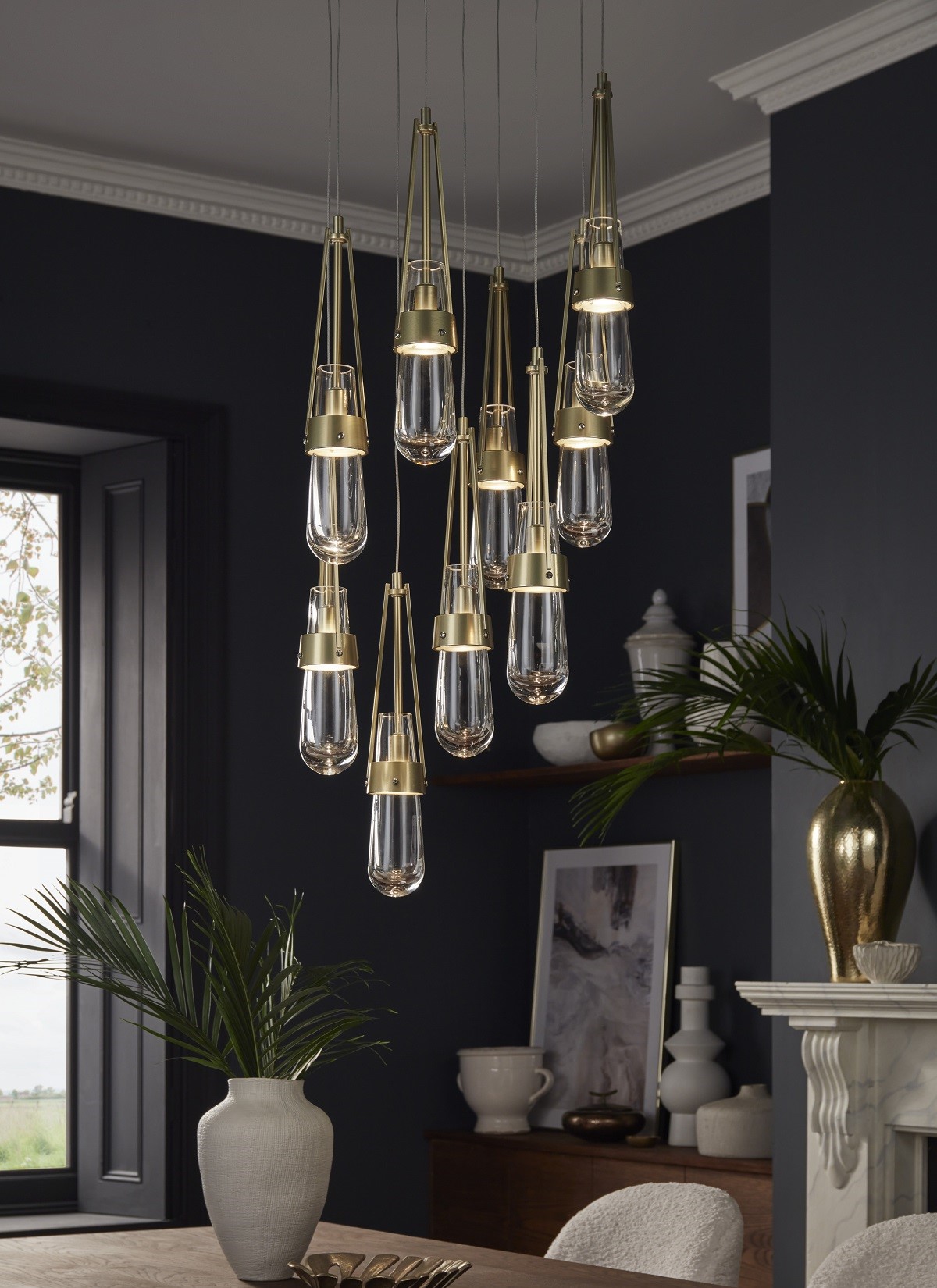 nine pendant lighting cluster as a statement light above dining table