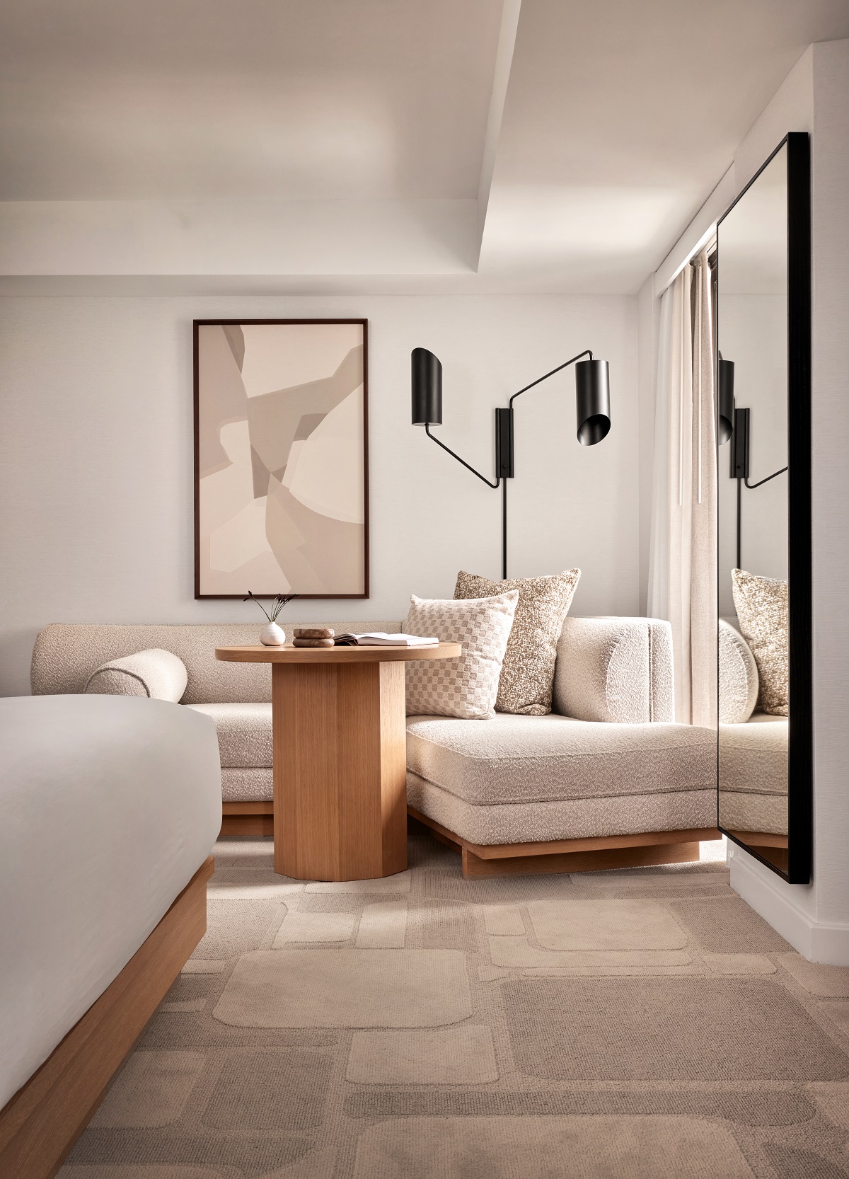shades and textures of wood, cream and brown in the hotel guestrooms