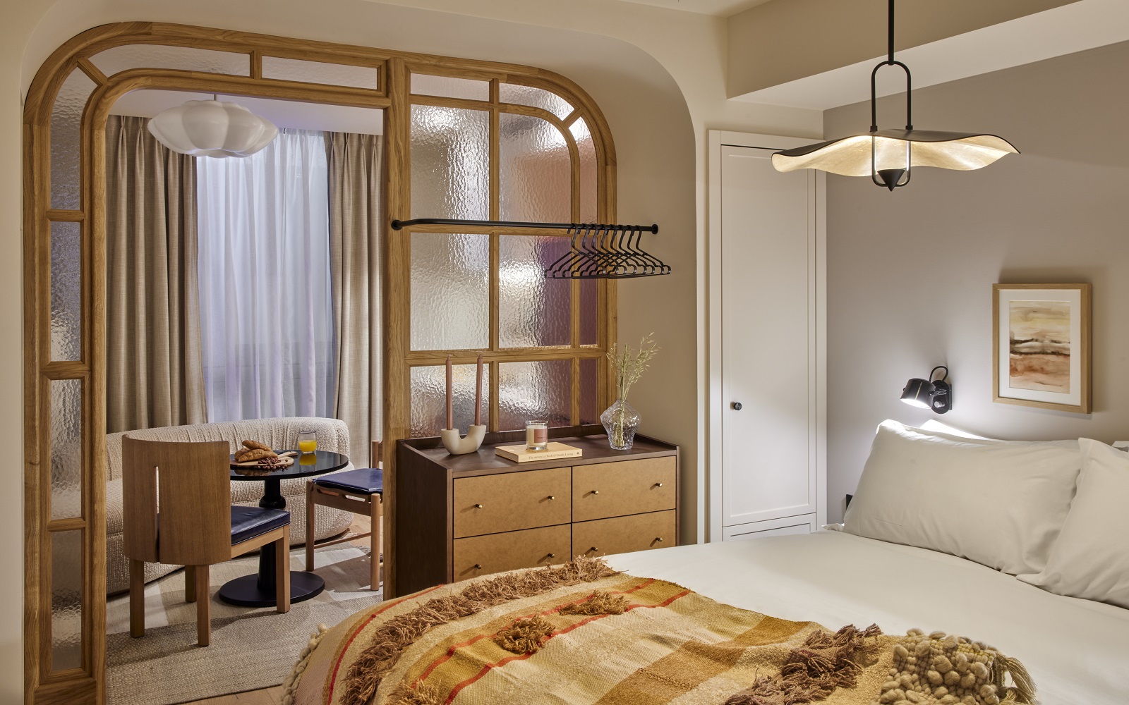 guestroom with curved wood dividing frame in Locke De Santa Joana Lisbon