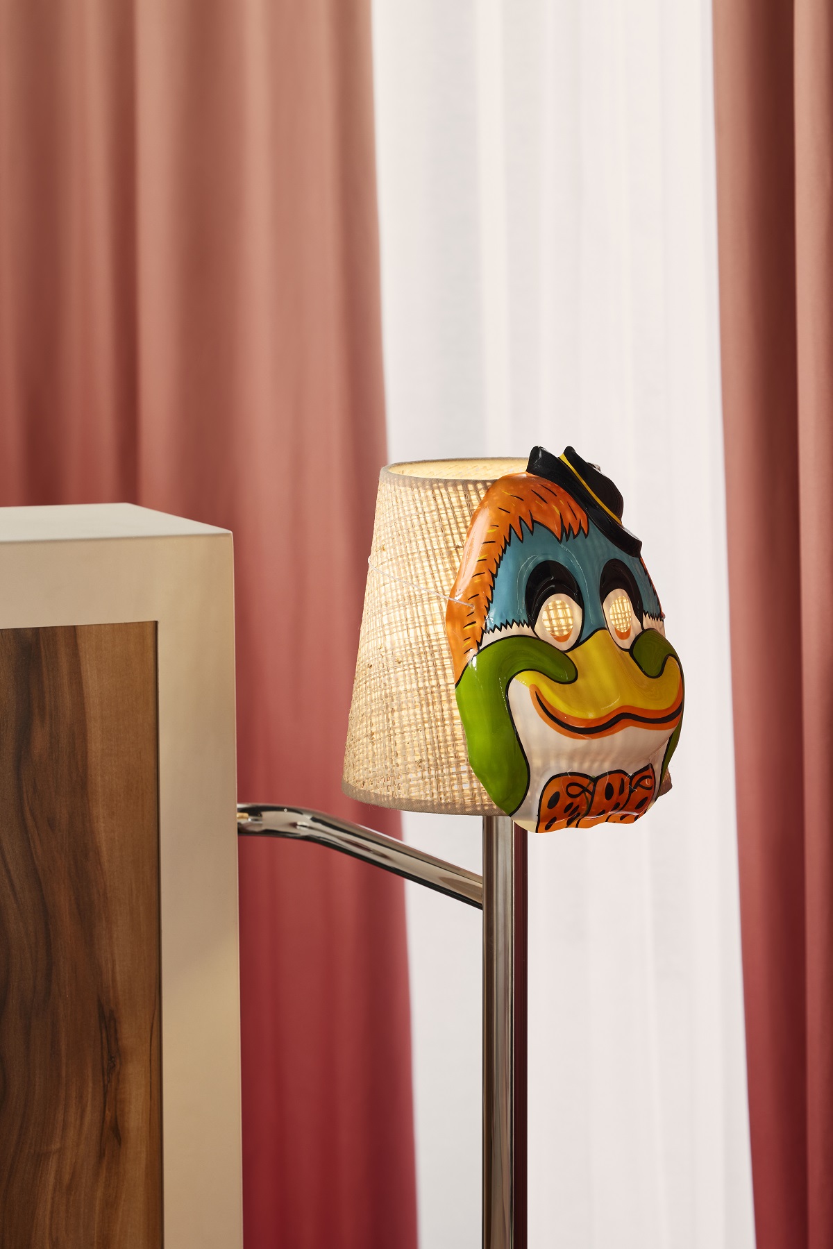 lamp in guestroom with signature Mama Shelter mask