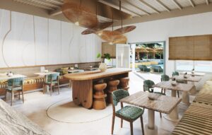 carved wooden seats and organic shaped tables in hotel restaurant