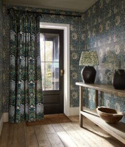 hallway with wallpaper and matching curtain fabric