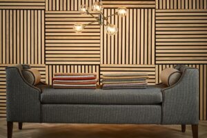 panelled wall behind chaise covered in skopos encanto fabric