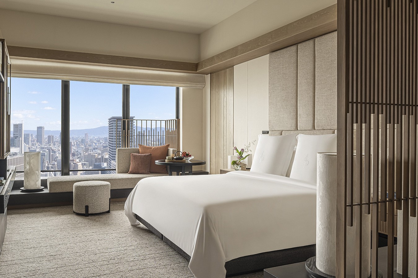 guestroom with view across Osaka in four Seasons Hotel Osaka