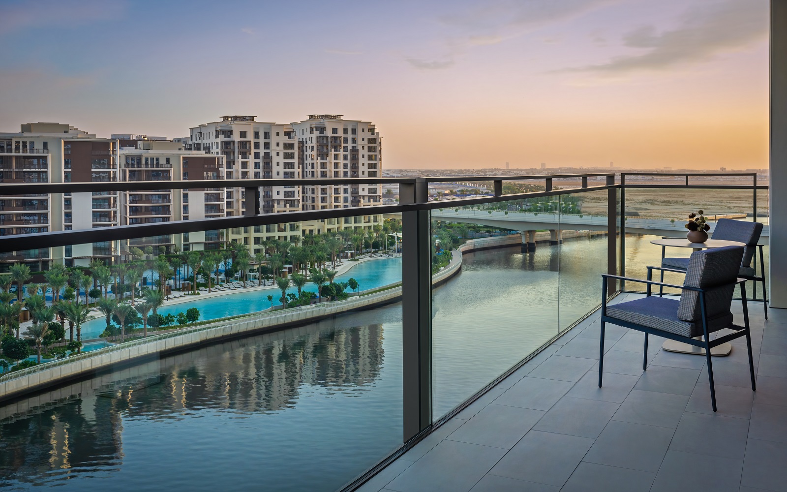 sunset view from terrace of executive suite at Palace Dubai Creek Harbour Hotel