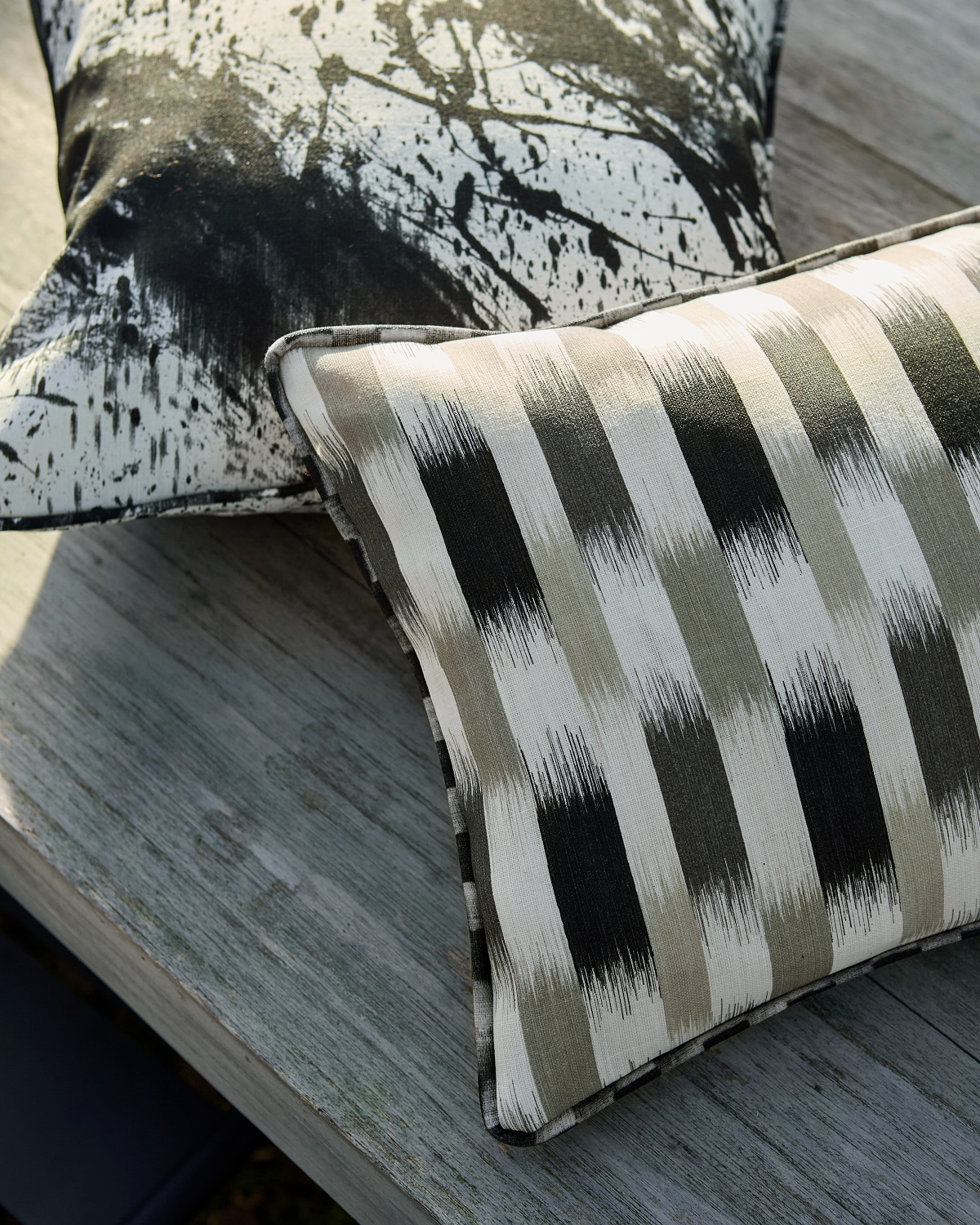monochromatic patterns and designs on cushions by Harlequin