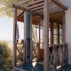 outdoor shower from AXOR on wooden deck on the beach