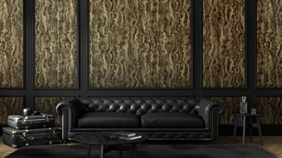 room set with black sofa in front of marbelised marmour wallcovering from Newmor