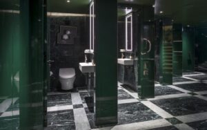 green marble bathroom with TOTO fittings at the Londoner hotel