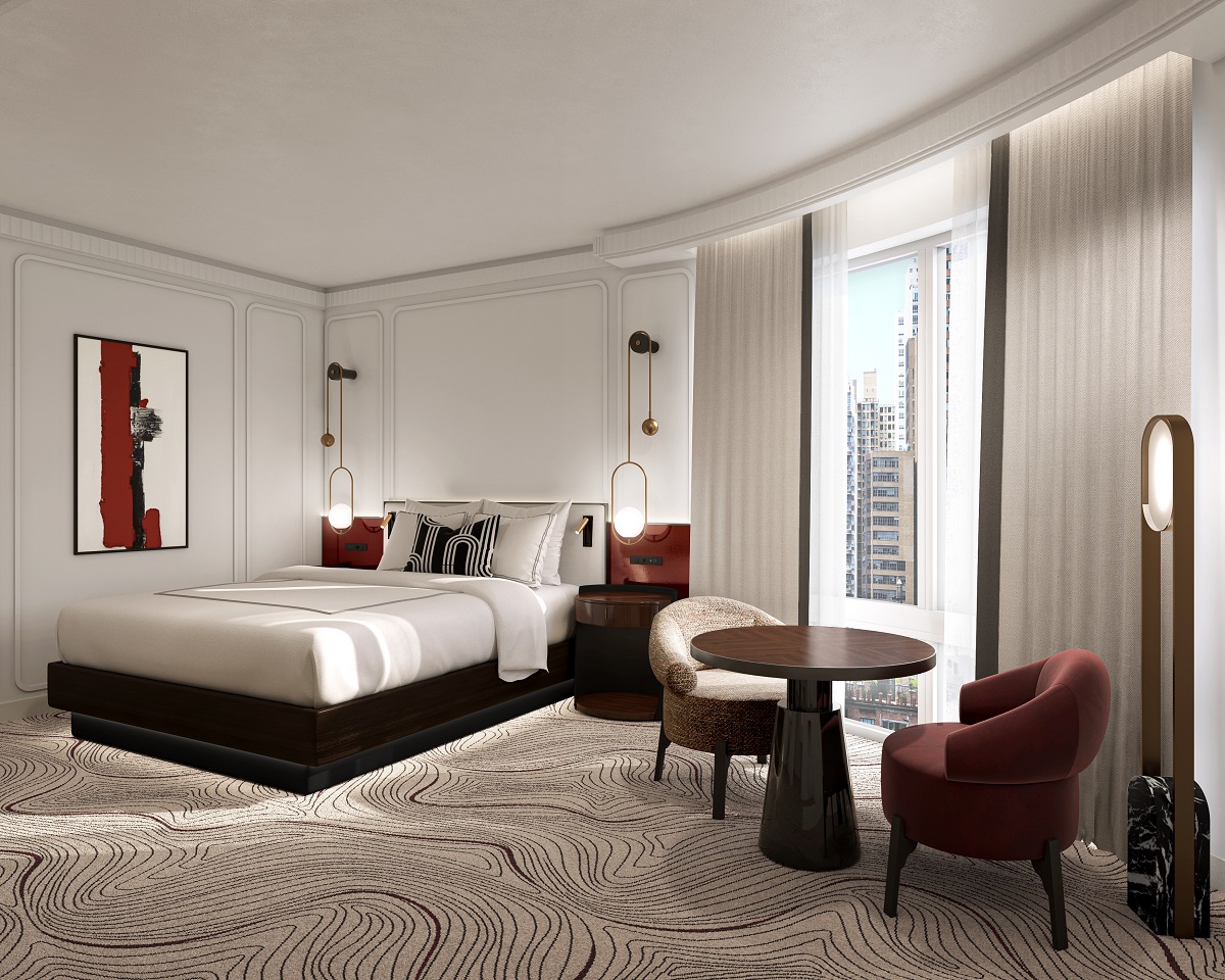 swirled black carpet in guestroom with red accents