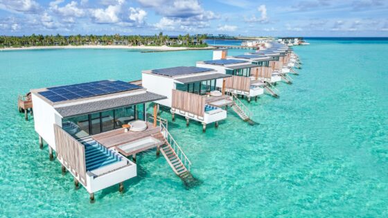 aerial image of SOMaldives over-water bungalows