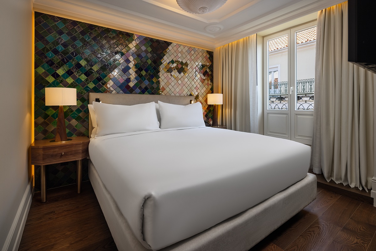 handpainted tiles behind hotel bed in Lisbon